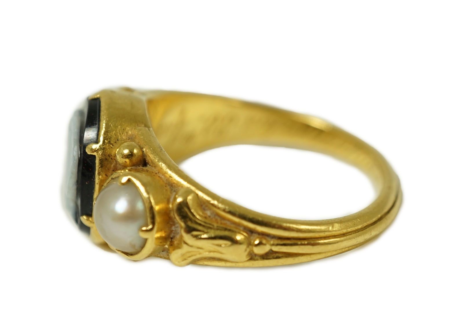 A William IV gold, split pearl and sardonyx set mourning ring